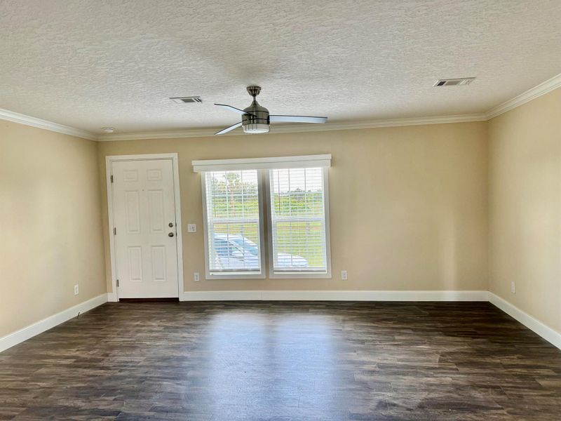 Spacious, unfurnished interior of a new home in , Okeechobee (Image 8).