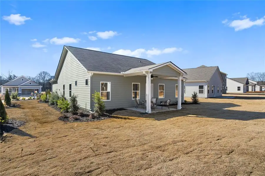 Exterior details and patio area of a home in Sycamore Crest, Calhoun (Image 3).