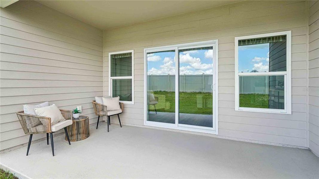 Exterior details and patio area of a home in Avalon Woods, Newberry (Image 2).