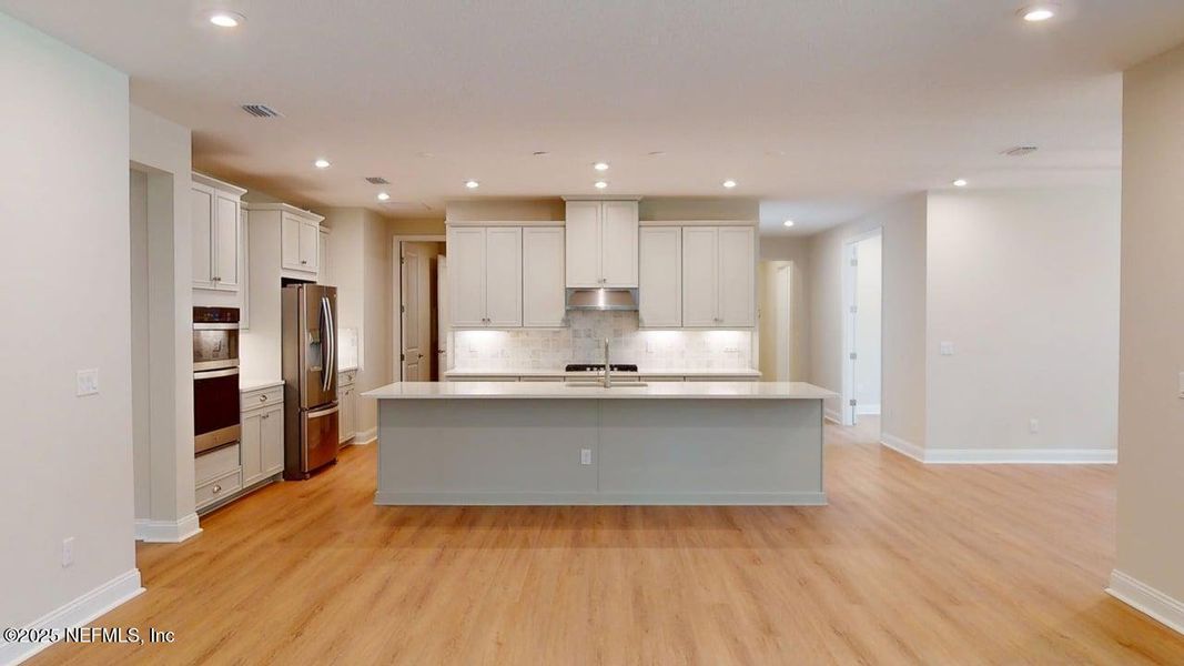 Furnished interior view inside a new home in RiverTown - WaterSong, St. Johns (Image 4).