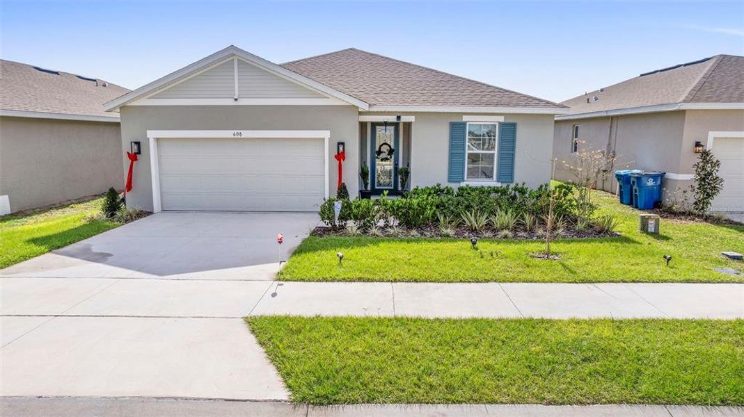 Front exterior of a new home in , Lake Wales, FL, highlighting curb appeal (Image 27). Front exterior of a new home in , Lake Wales, FL, highlighting curb appeal (Image 27).