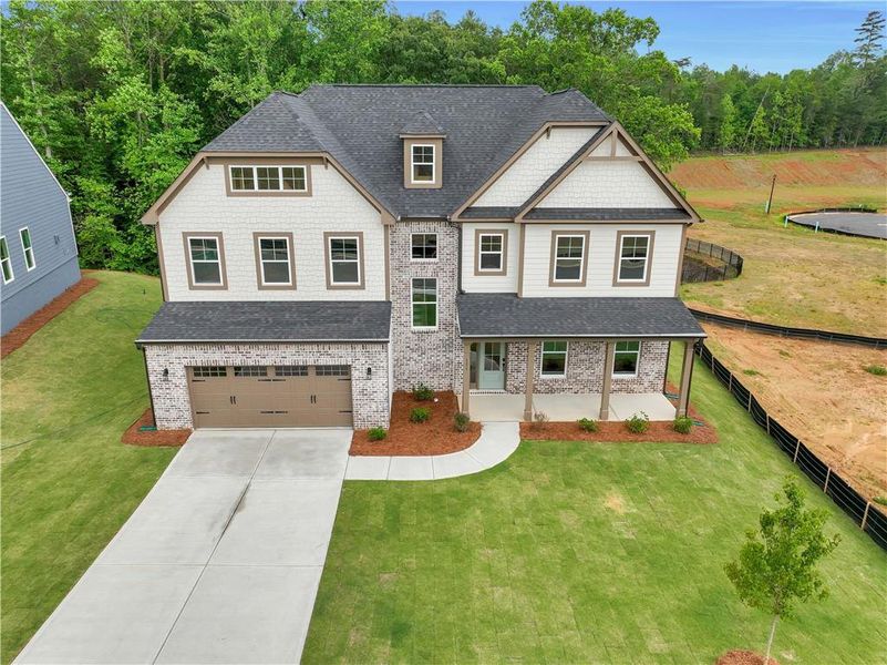 Front exterior of a new home in Arbor West, Dawsonville, GA, highlighting curb appeal (Image 29).