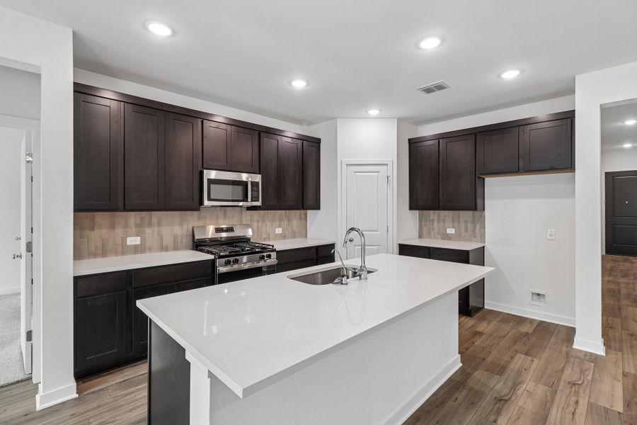 Furnished interior view inside a new home in Parkton Square, Kyle (Image 6).