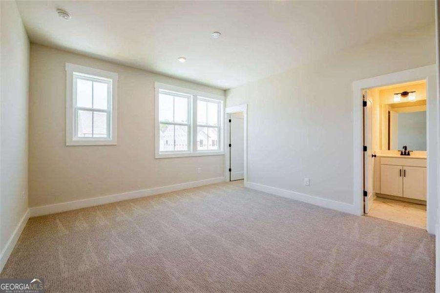 Spacious, unfurnished interior of a new home in The Paddocks at Doc Hughes, Buford (Image 32).