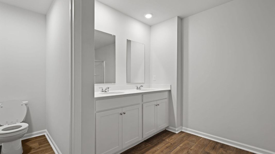 Furnished interior view inside a new home in Pine Hills at Cane Bay, Summerville (Image 6). Furnished interior view inside a new home in Pine Hills at Cane Bay, Summerville (Image 6).