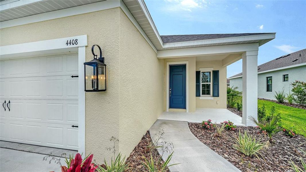 Exterior details and patio area of a home in Canoe Creek, Parrish (Image 4).