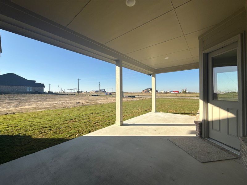 Exterior details and patio area of a home in Clear Sky Addition, Valley View (Image 3).
