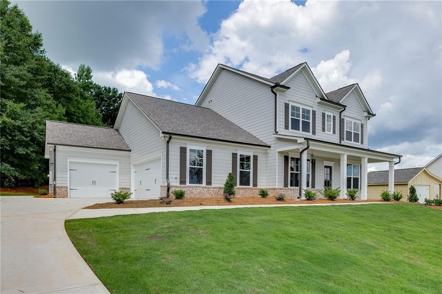 Front exterior of a new home in , Jefferson, GA, highlighting curb appeal (Image 2). Front exterior of a new home in , Jefferson, GA, highlighting curb appeal (Image 2).