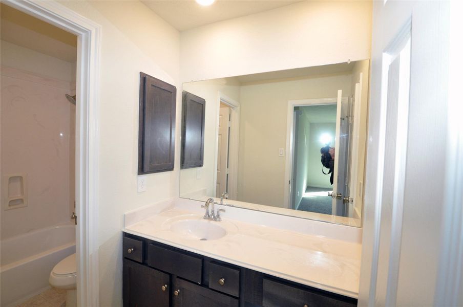 Furnished interior view inside a new home in Pedregal, League City (Image 11).