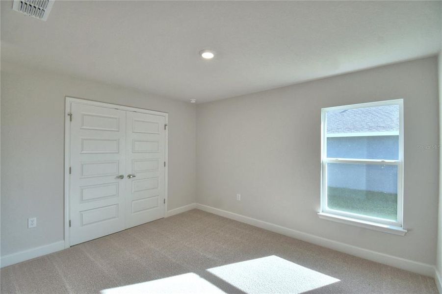 Spacious, unfurnished interior of a new home in Cadence Crossing, Auburndale (Image 29).