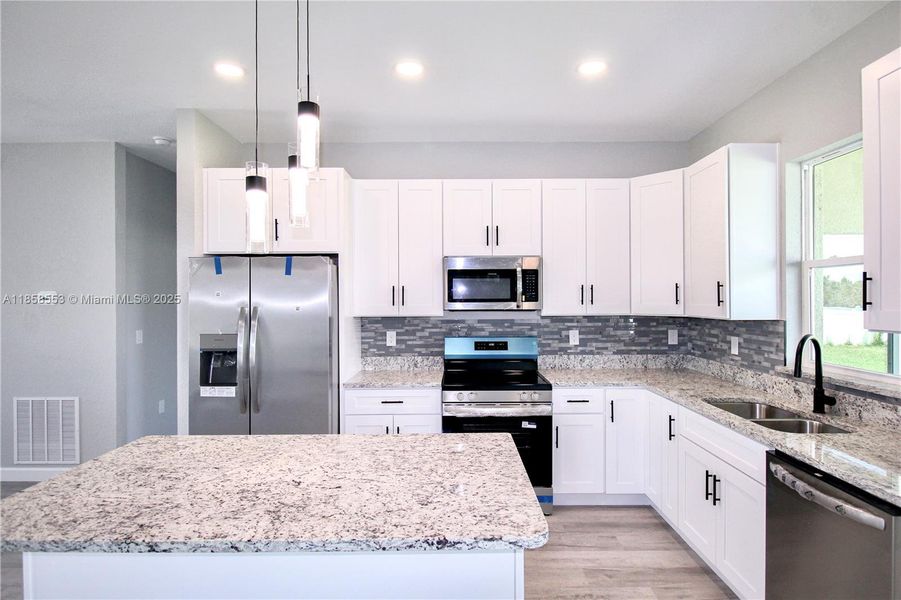 Furnished interior view inside a new home in , Sebring (Image 9). Furnished interior view inside a new home in , Sebring (Image 9).