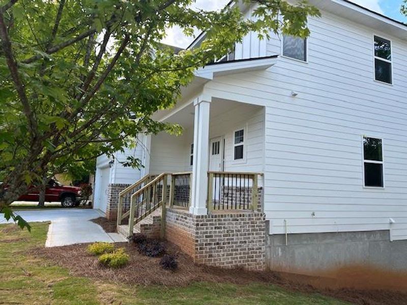 Exterior details and patio area of a home in Habersham Meadows, Demorest (Image 4).