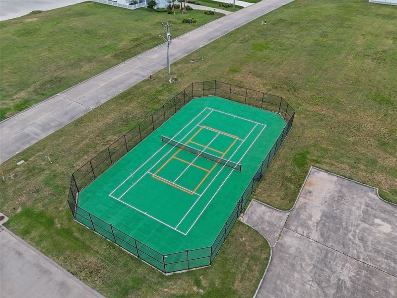 Residents also enjoy access to well-maintained tennis and pickleball courts within this exclusive coastal neighborhood. Residents also enjoy access to well-maintained tennis and pickleball courts within this exclusive coastal neighborhood.