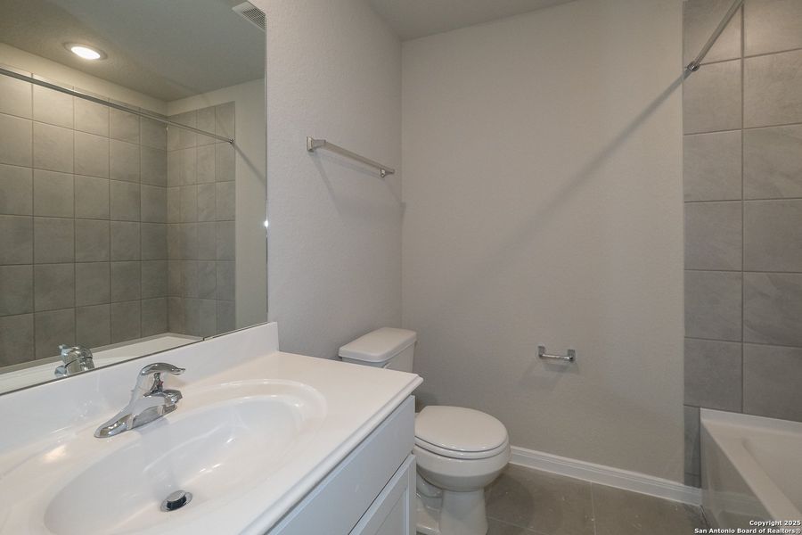 Furnished interior view inside a new home in Greenspoint Heights, Seguin (Image 9).