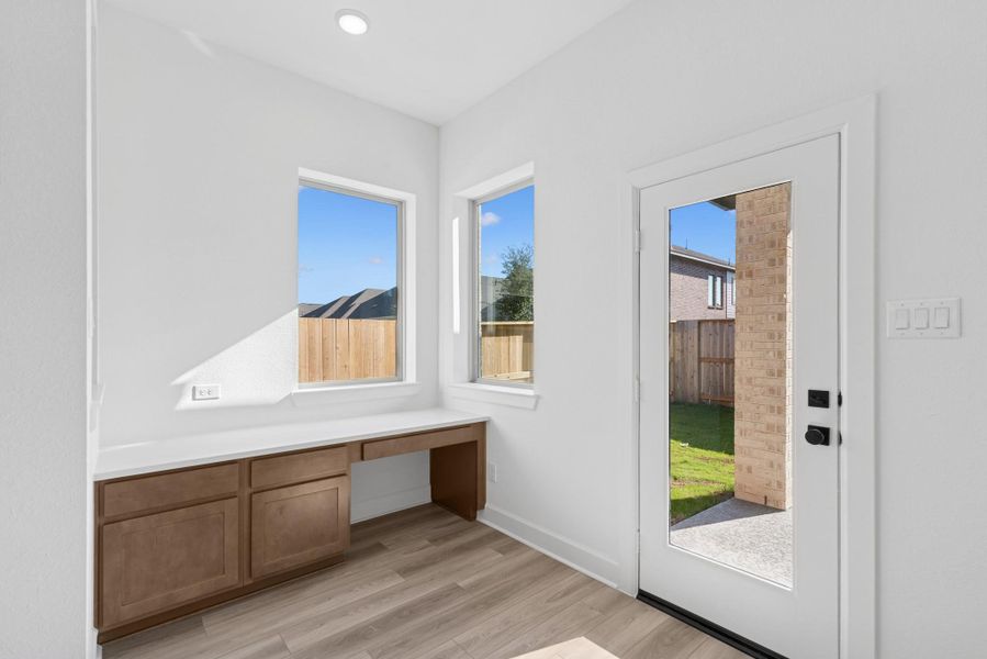 Furnished interior view inside a new home in Meridiana 55' Homesites, Manvel (Image 6).