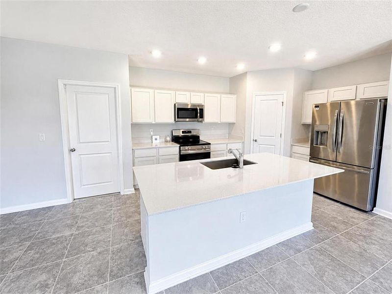 Furnished interior view inside a new home in , Kissimmee (Image 6).