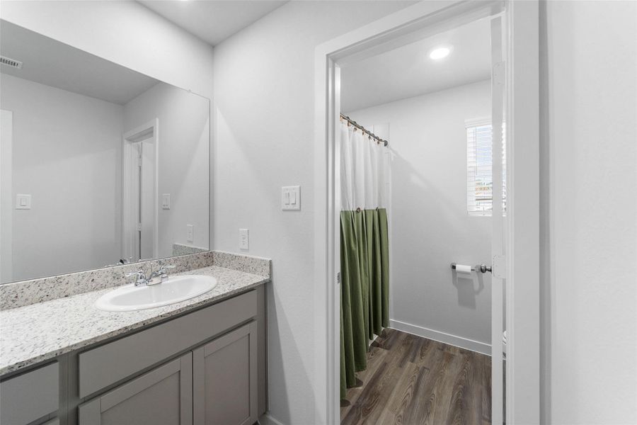 Furnished interior view inside a new home in Lakes at Black Oak, Magnolia (Image 10). Furnished interior view inside a new home in Lakes at Black Oak, Magnolia (Image 10).