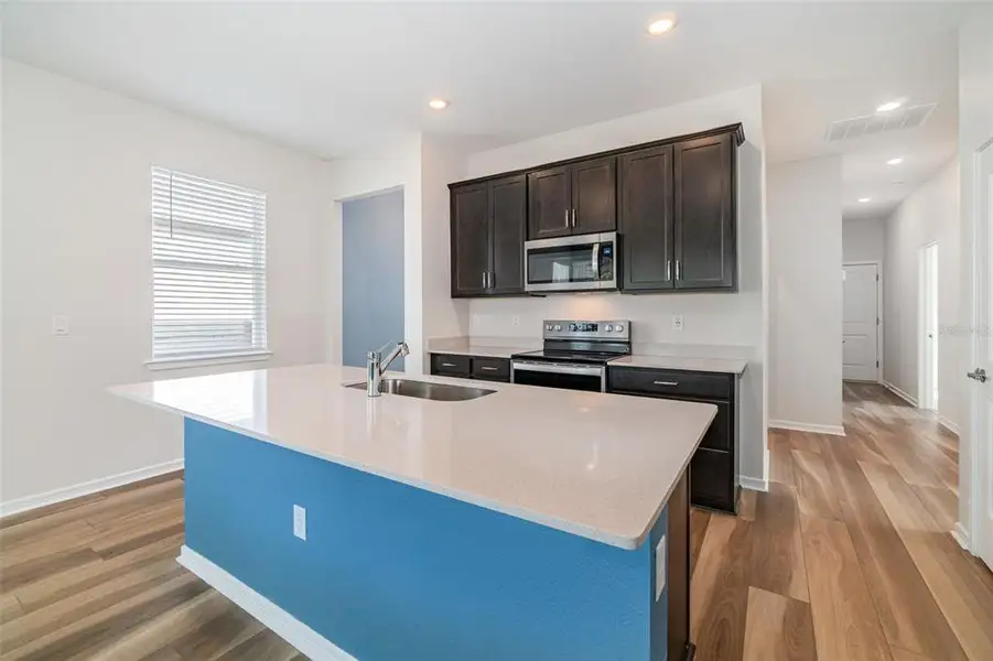 Furnished interior view inside a new home in , Clermont (Image 12).
