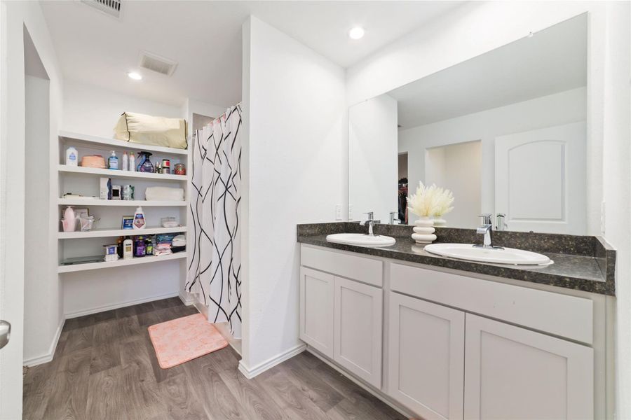 Furnished interior view inside a new home in Breckenridge Forest, Spring (Image 9). Furnished interior view inside a new home in Breckenridge Forest, Spring (Image 9).