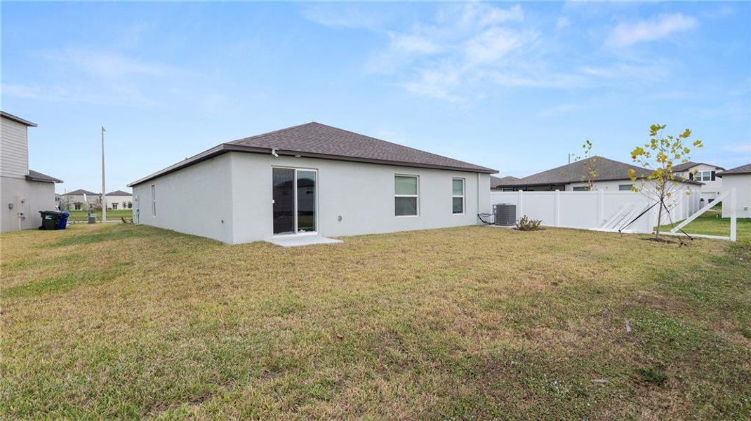 Exterior details and patio area of a home in Cypress Point at Lake Parker: The Estates, Lakeland (Image 29).