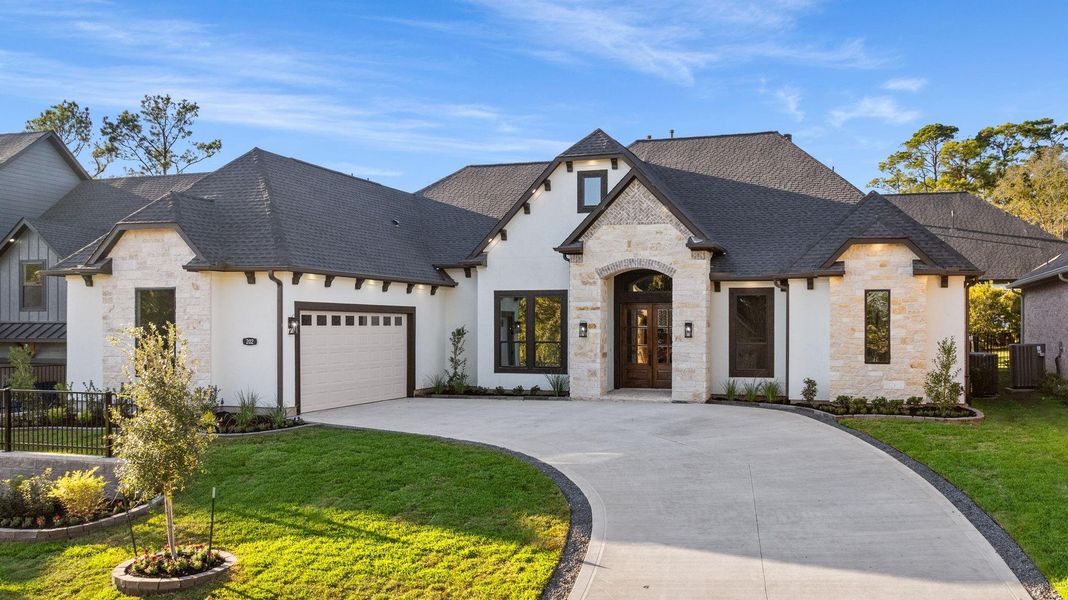 Front exterior of a new home in , Montgomery, TX, highlighting curb appeal (Image 31).