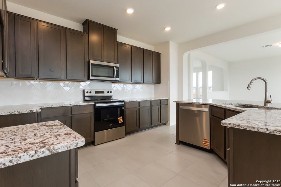 Furnished interior view inside a new home in Hidden Bluffs at TRP, San Antonio (Image 4).