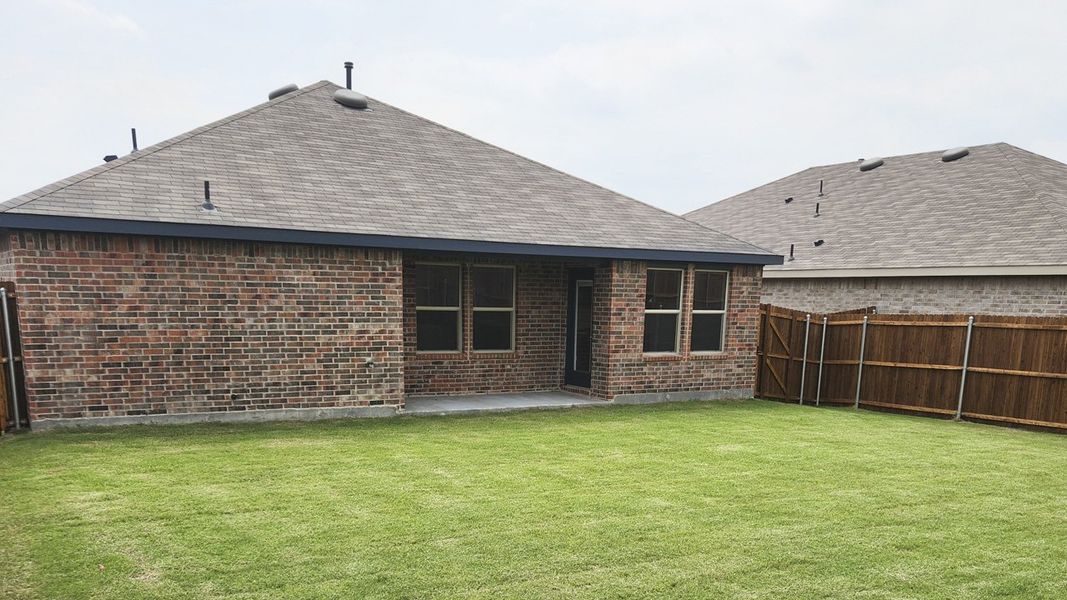 Exterior details and patio area of a home in Cartwright Ranch, Crandall (Image 2). Exterior details and patio area of a home in Cartwright Ranch, Crandall (Image 2).