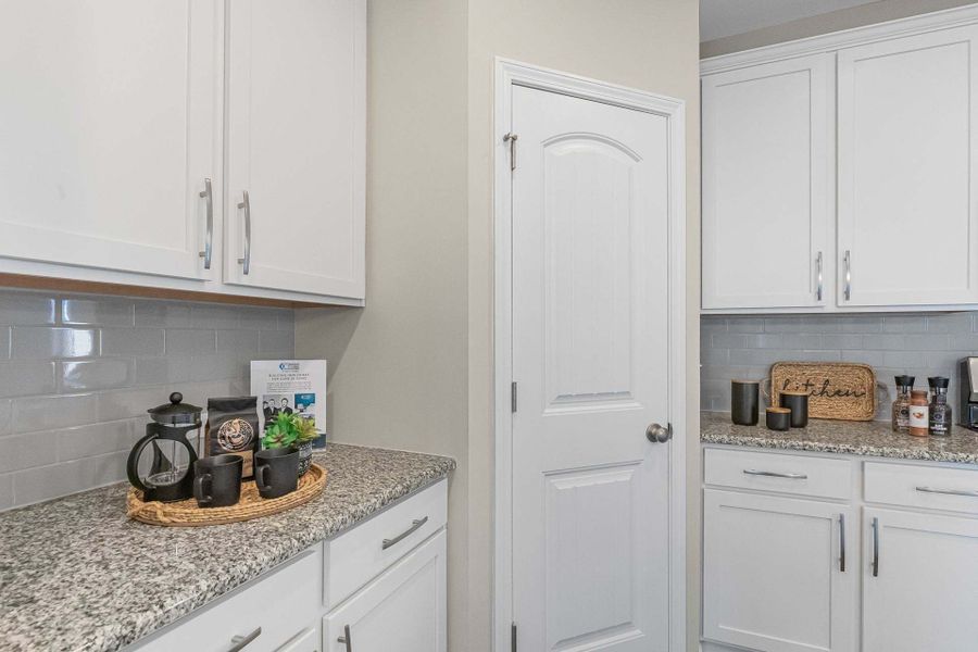 Representative furnished interior of a home built from the Aberdeen by Caviness & Cates Communities in Bartlett Manor, Youngsville (Image 139).