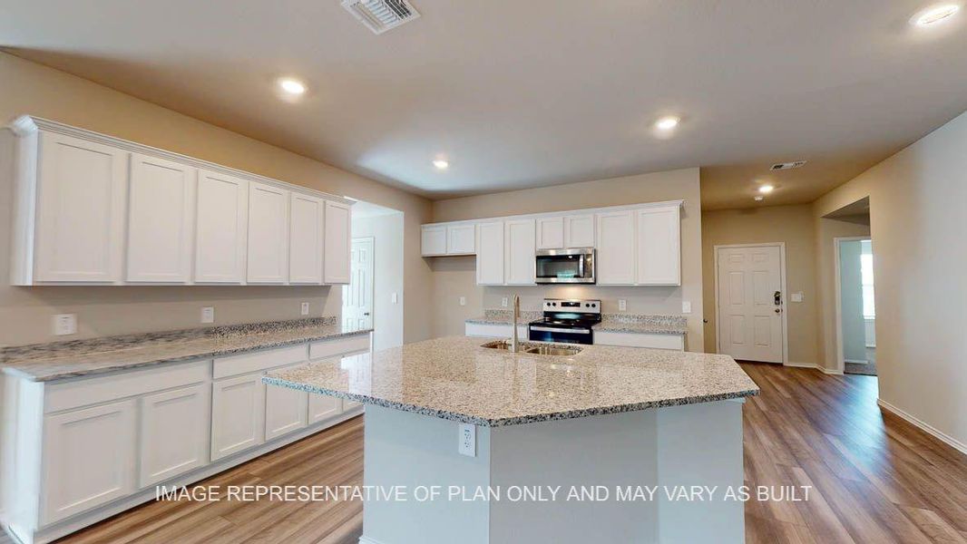 Furnished interior view inside a new home in Reserve at Mallard Lakes, Orange (Image 11).