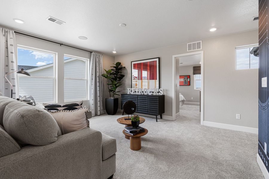 Representative furnished interior of a home built from the Fairmount | A Multi-Gen Home by Taylor Morrison in Trailstone, Arvada (Image 28).