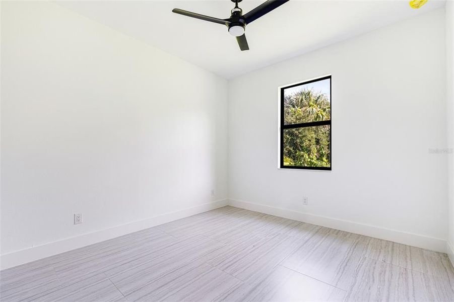 Spacious, unfurnished interior of a new home in , Port Charlotte (Image 24).