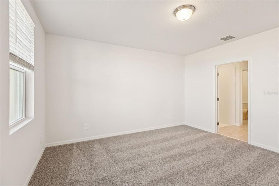 Spacious, unfurnished interior of a new home in The Reserve at Hammock Oaks - Classic Series, Lady Lake (Image 10).