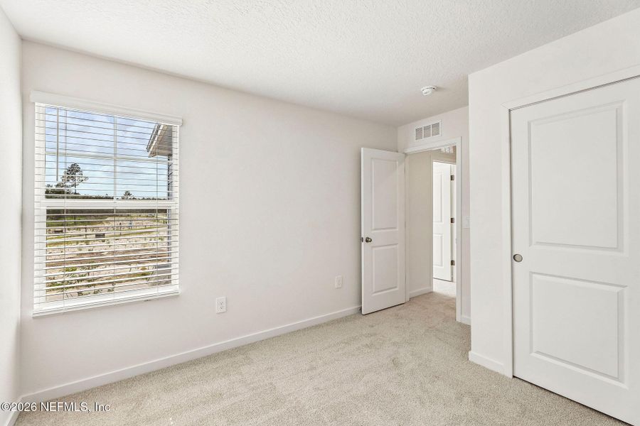 Spacious, unfurnished interior of a new home in The District at Oakleaf - The Grove, Middleburg (Image 16).