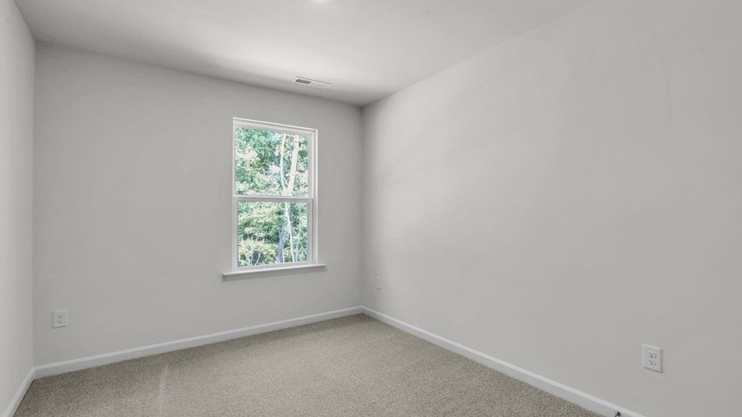 Spacious, unfurnished interior of a new home in The Townes at Bexford, Willow Spring (Image 18). Spacious, unfurnished interior of a new home in The Townes at Bexford, Willow Spring (Image 18).
