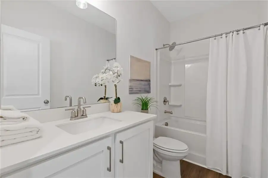 Furnished interior view inside a new home in , Suwanee (Image 10).