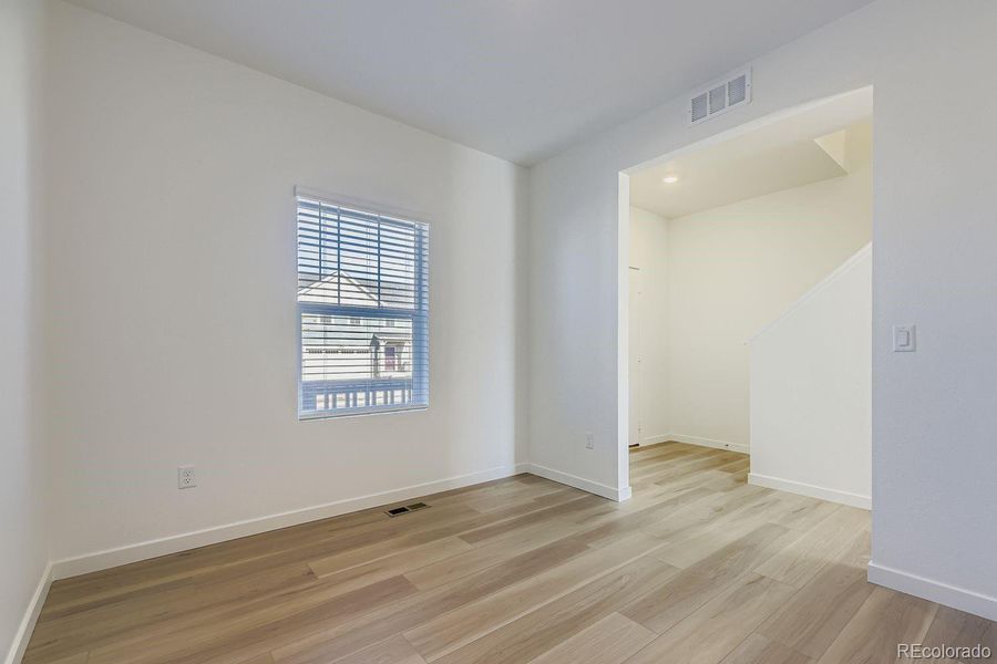 Spacious, unfurnished interior of a new home in Eastcreek Farm: The Camden Collection, Thornton (Image 11).