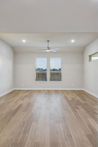 Living Room in the Wimbledon home plan by Trophy Signature Homes – REPRESENTATIVE PHOTO Living Room in the Wimbledon home plan by Trophy Signature Homes – REPRESENTATIVE PHOTO