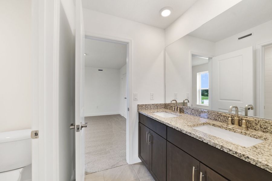 Furnished interior view inside a new home in Vintner Reserve, Clermont (Image 12).