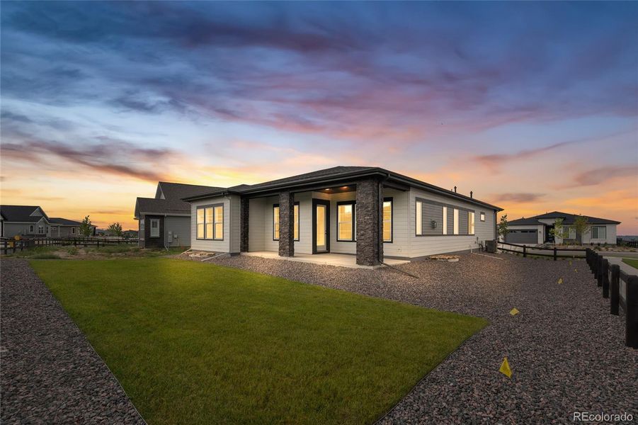 Exterior details and patio area of a home in Hilltop at Inspiration, Aurora (Image 3).