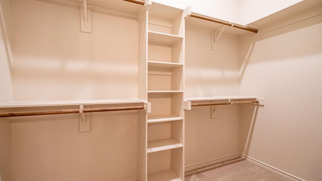 Large primary walk in closet Large primary walk in closet