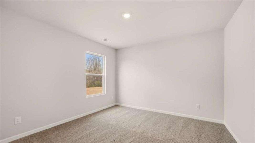 Spacious, unfurnished interior of a new home in Bridle Creek, Locust Grove (Image 22).
