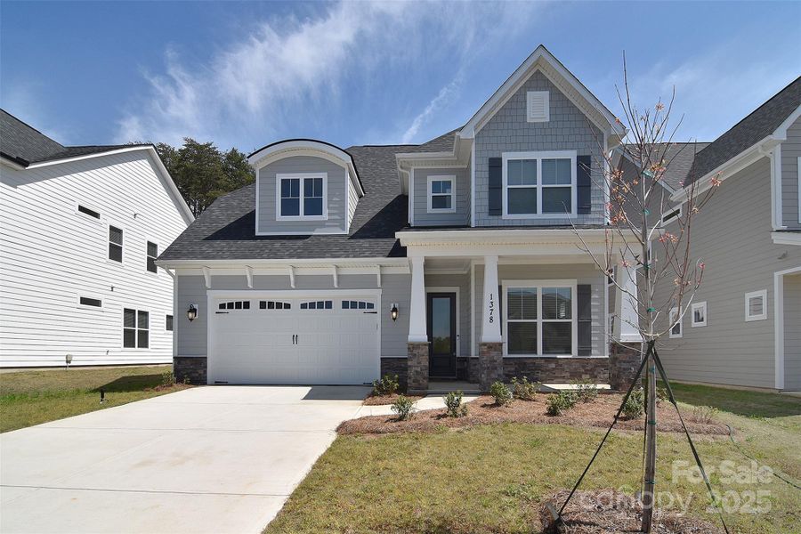 Front exterior of a new home in Wildbrook, Denver, NC, highlighting curb appeal (Image 2).