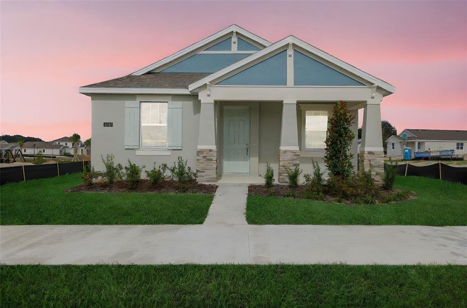 Front exterior of a new home in Crossroads at Kelly Park, Apopka, FL, highlighting curb appeal (Image 19).