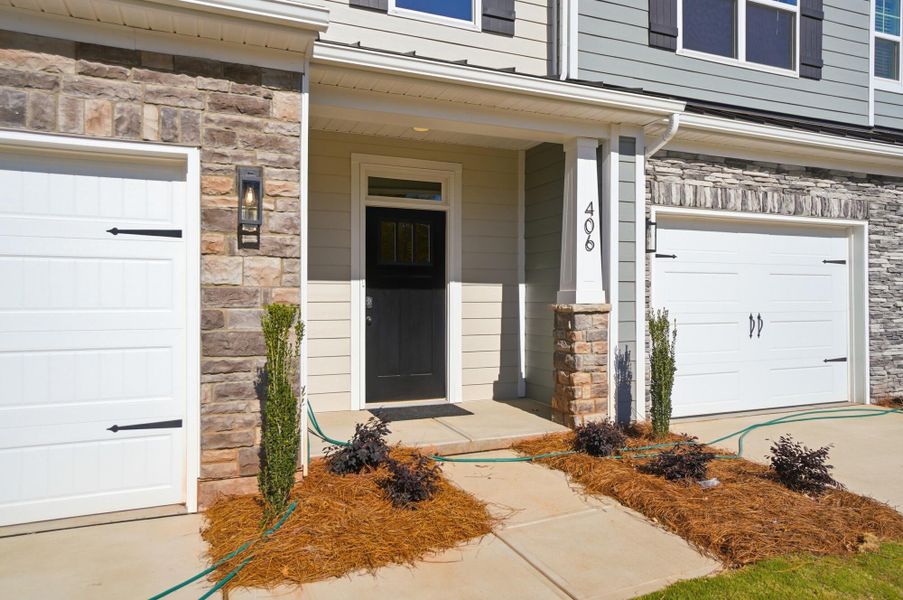 Exterior details and patio area of a home in Blythe Mill Townhomes, Waxhaw (Image 4).