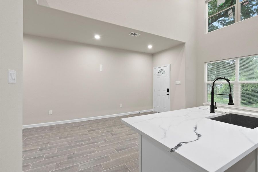 View from kitchen island of entry, living, dining View from kitchen island of entry, living, dining