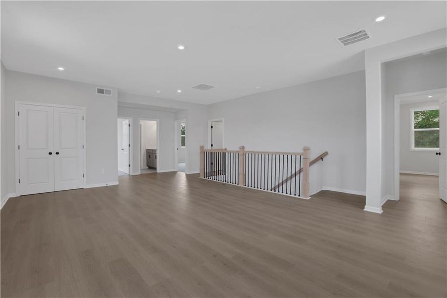 Spacious, unfurnished interior of a new home in The Paddocks at Doc Hughes, Buford (Image 21).
