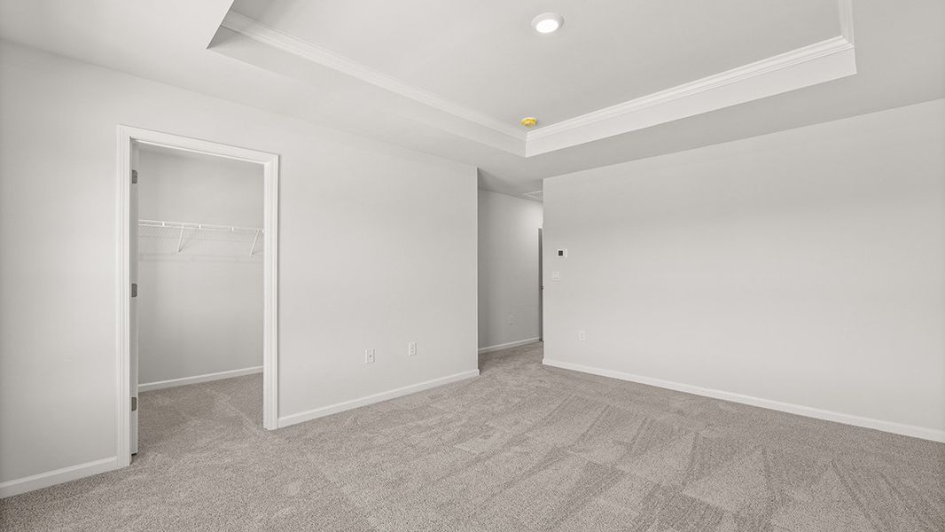Representative unfurnished interior of a home built from the AMESBURY by D.R. Horton in Waypoint, Flowery Branch (Image 19).