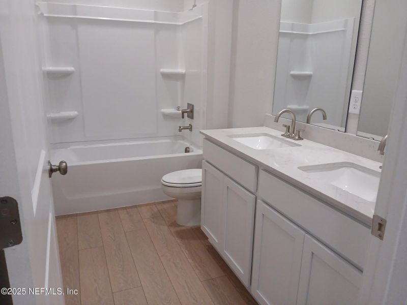 Furnished interior view inside a new home in The Preserve at Concourse Crossing, Fernandina Beach (Image 4).