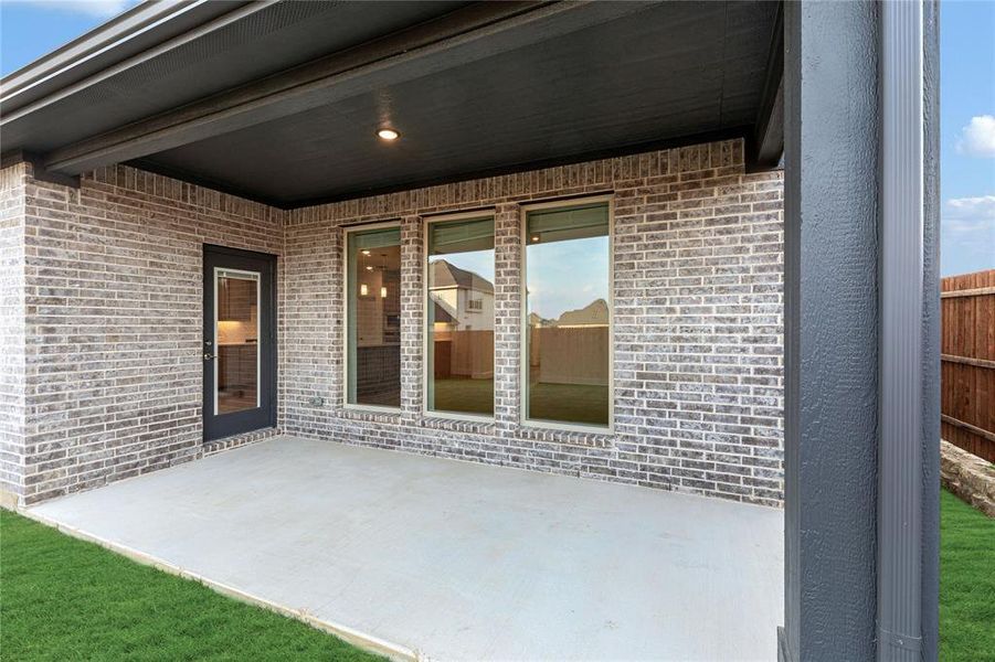 Exterior details and patio area of a home in Country Lakes Classic 60, Argyle (Image 3).