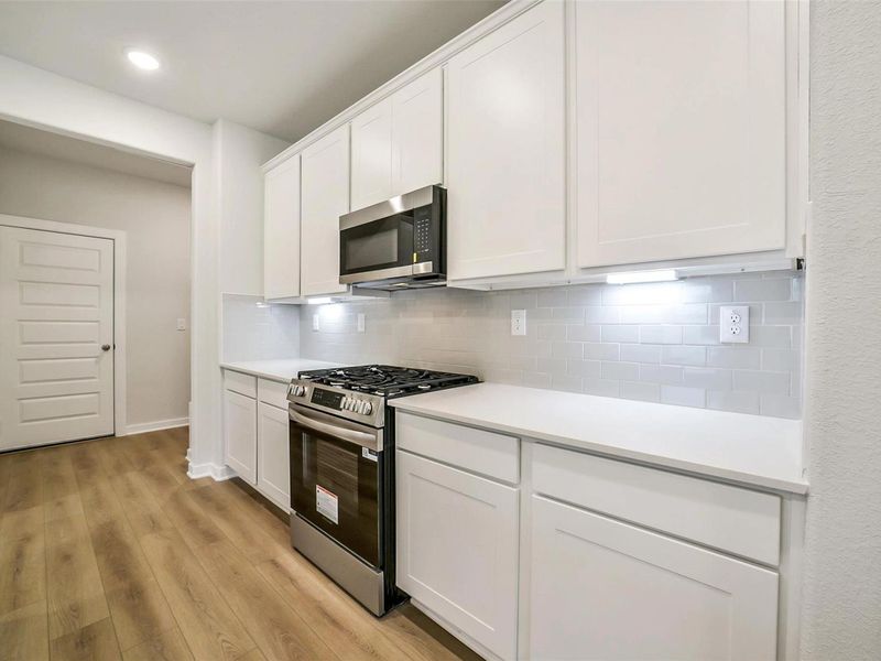Furnished interior view inside a new home in Lakes at Black Oak, Magnolia (Image 9). Furnished interior view inside a new home in Lakes at Black Oak, Magnolia (Image 9).